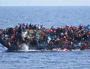 Almost 100 migrants missing off Libyan coast, says Navy