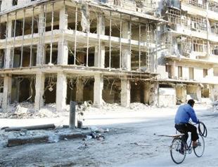 EU threatens Russia with sanctions over Syria