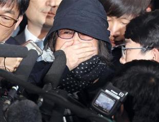 Prosecutors detain woman at core of South Korea political crisis