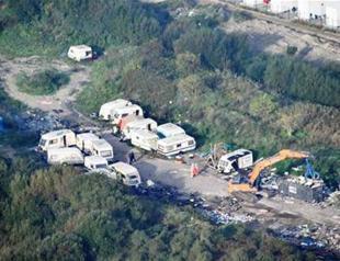 France clears Calais camp as concern mounts in Paris