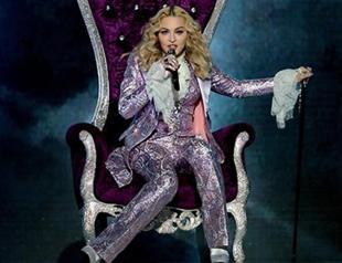 Madonna takes adopted children on visit home to Malawi