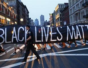 Protests over shootings block roads in US cities, arrests made