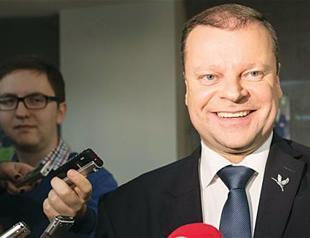 Center-right opposition claims victory in Lithuania vote, to start coalition talks