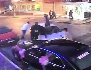 Driver rams car into crowd after disagreement over dance position