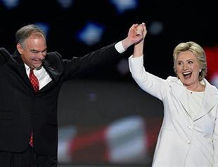 Accepting the nomination, Clinton casts herself as clear-eyed leader