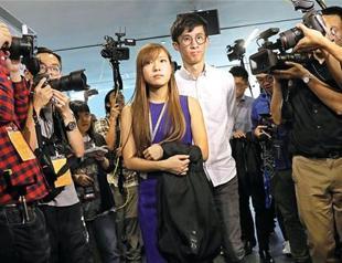 Hong Kong backs China bid to bar rebel lawmakers