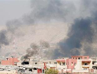 Iraq peshmerga storm ISIL town as army battles in Mosul