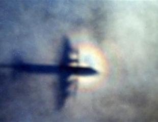 Still grieving, French man seeks clues to Flight 370 mystery