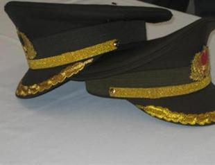 Major who notified intel agency about coup attempt suspended