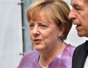 Support for Germany’s Merkel plunges after attacks