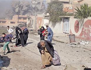 Iraqi paramilitaries say reached airport west of Mosul