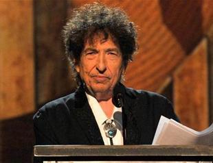 Dylan honored to receive Nobel despite no-show