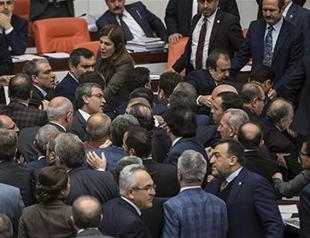 Turkish Parliament speaker meets parties after punches fly at General Assembly