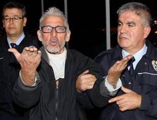 Cyclist detained after attempting to set police car on fire