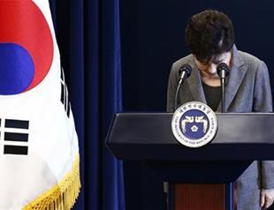 S Korea president says she is willing to leave office early