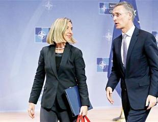 NATO chief urges West to keep pressuring Russia over Ukraine
