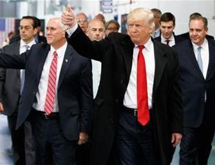 Trump chooses hardliners but talks softer on immigration