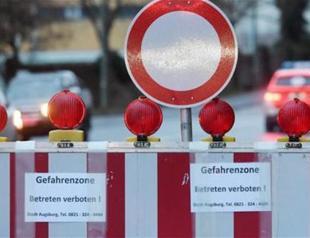 54,000 Germans start leaving home Christmas morning for WWII bomb defuse