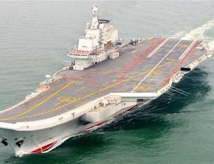 Taiwan warns of growing threats from China