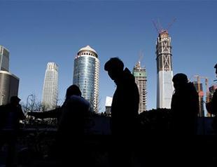 China GDP beats expectations but debt risks loom