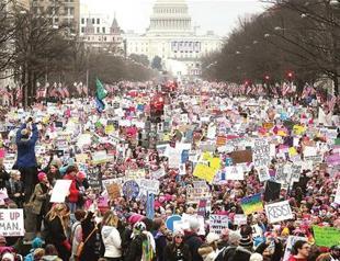 Women lead huge rights protests across US, globe