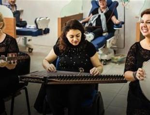 Band plays for cancer patients receiving chemotherapy in hospital in Istanbul