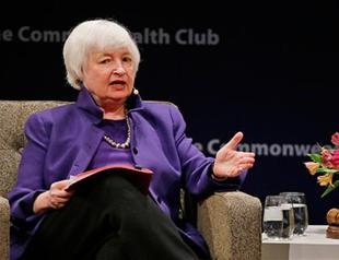 Stocks, currencies fall after Fed’s Yellen signals rate hikes