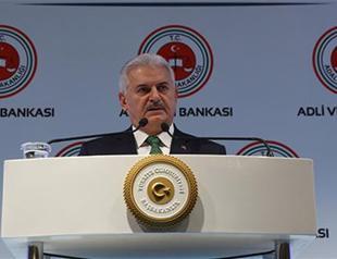 Turkish PM calls on judges to expedite putschist trials