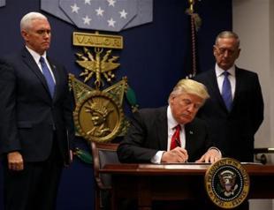 Trump bars door to refugees, visitors from seven nations