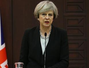 British PM May urges rule of law in fight against Turkish coup plotters