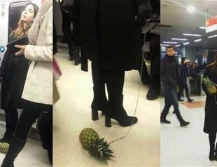 Woman takes pineapple for walk on Ankara’s metro