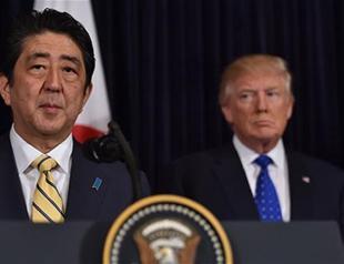 Trump and Abe retreat to Florida for golf diplomacy