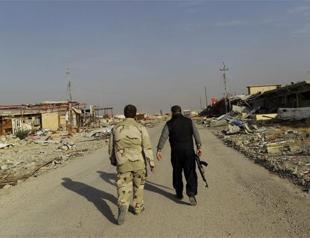 Heavy fighting as ISIL attacks Iraqi forces in Mosul