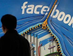 Facebook eases past Wall St estimates, sees spending up in 2017