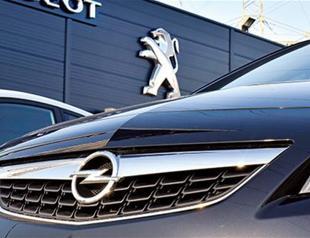 Eyeing Opel, Peugeot posts 80 pct profit rise