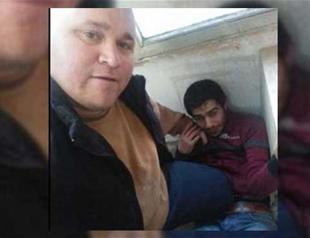 Turkish man who stepped on Syrian worker in photo detained in Turkey’s İzmir