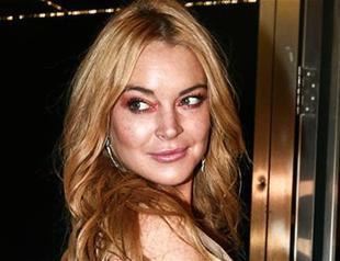 Lindsay Lohan says she was profiled while wearing headscarf