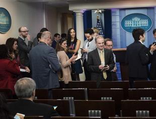 White House bars some news organizations from briefing