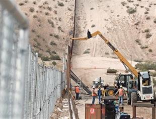 Mexico vows to impose tariffs if Trump presses wall payment