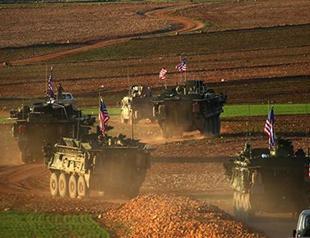 Questions linger on who controls Syrian town of Manbij