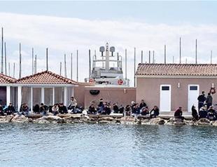 Human traffickers, 83 migrants caught on luxury yacht