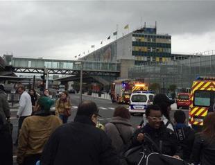 Flights resume at Paris airport as attacker’s family under interrogation