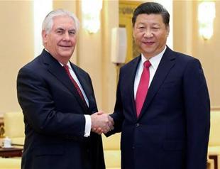 Xi, Tillerson seek stronger ties as N Korea hails rocket progress