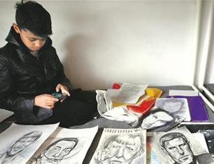 ‘Little Picasso’ draws admiration in squalid Serbian camp