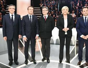 Macron seen winning French TV debate, clashes with Le Pen