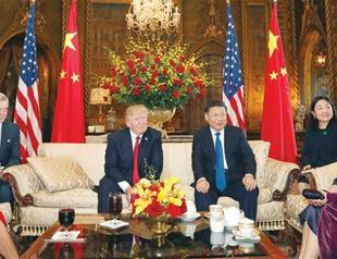 China’s Xi urges trade cooperation in first meeting with Trump