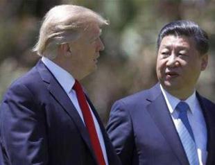 US-China ties warm over currency, Syria