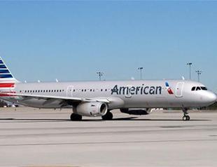 American Airlines apologizes for onboard clash over stroller