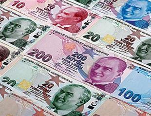 Turkish Lira slides to new record lows against dollar, euro