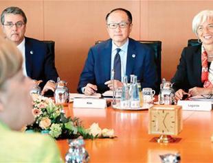 IMF, WTO, OECD vow to defend free trade against protectionism